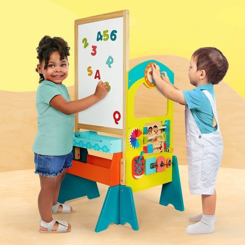 Kids play with a learning play set
