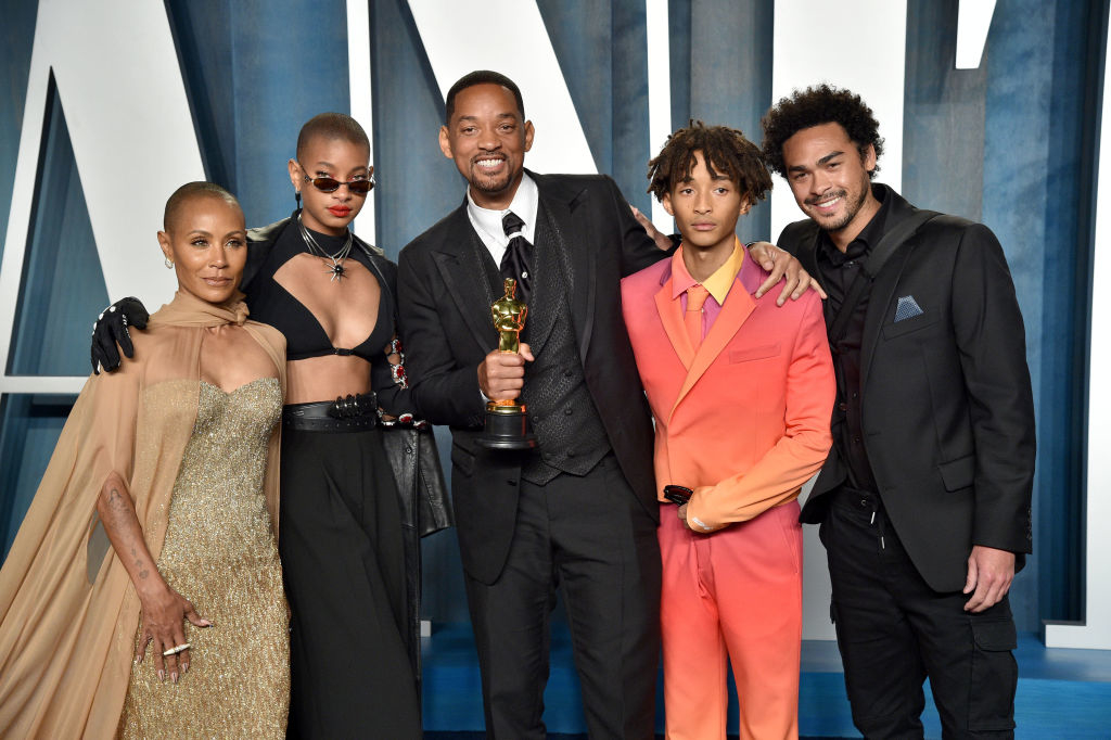 Jada and Will, who&#x27;s holding an award, and their children