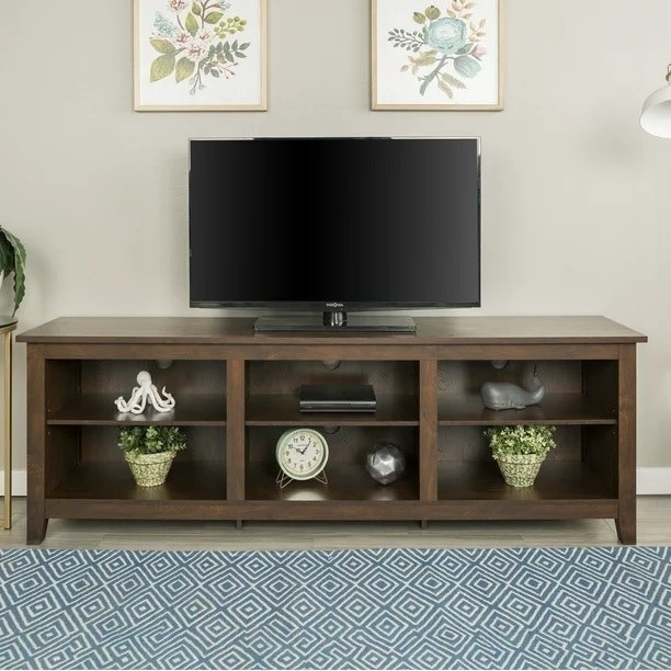 The tv stand with a tv on it
