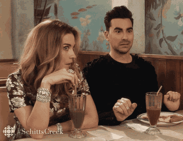 Alexis and Davod Rose from &quot;Schitt&#x27;s Creek&quot; at a restaurant.