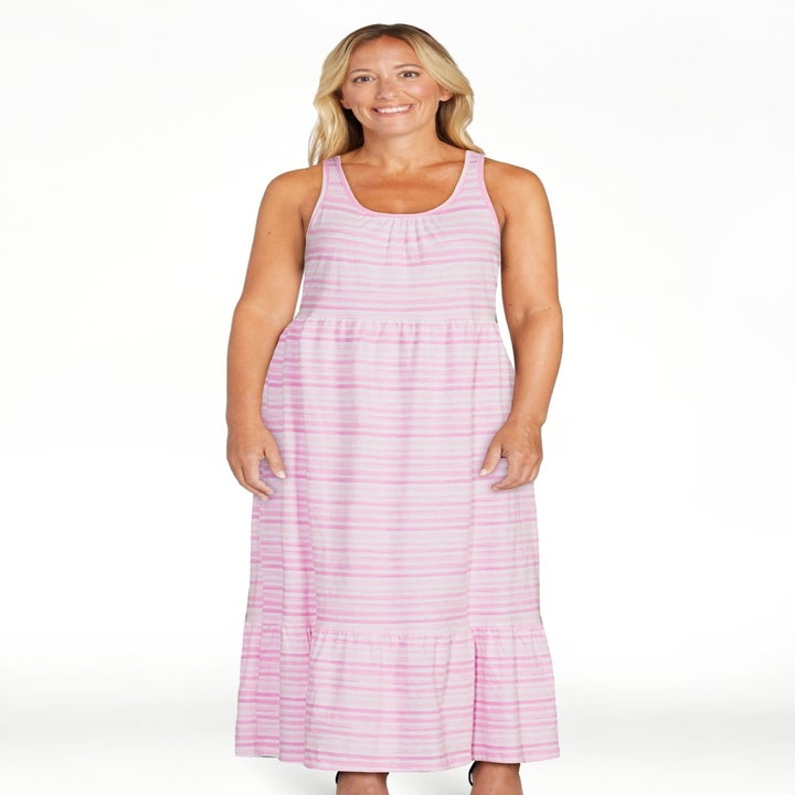 Model wearing the pink stripe dress