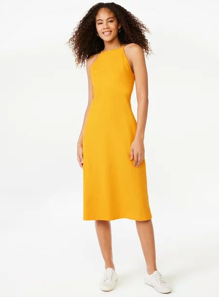Model wearing the cadmium yellow dress
