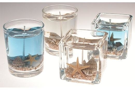 Close-up of four gel candles with underwater themes