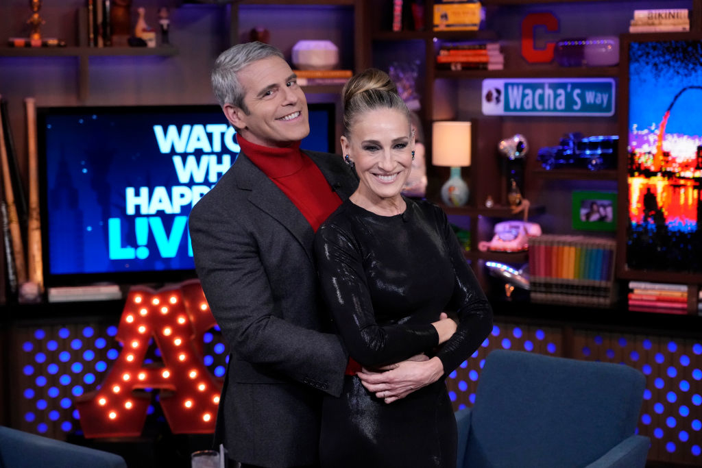 Close-up of Andy hugging SJP on the WWHL set