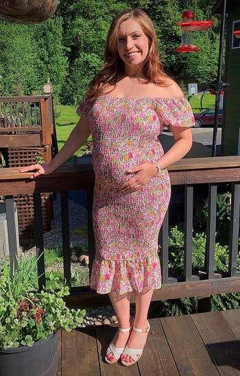Reviewer wearing the dress in floral