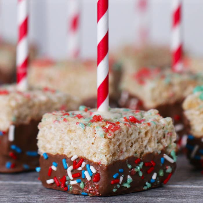 rice krispies treat with red white and blue sprinkles and chocolate coating