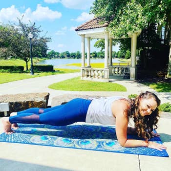 reviewer connected  a bluish  patterned yoga mat