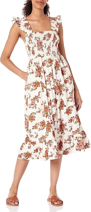 model wearing floral midi dress