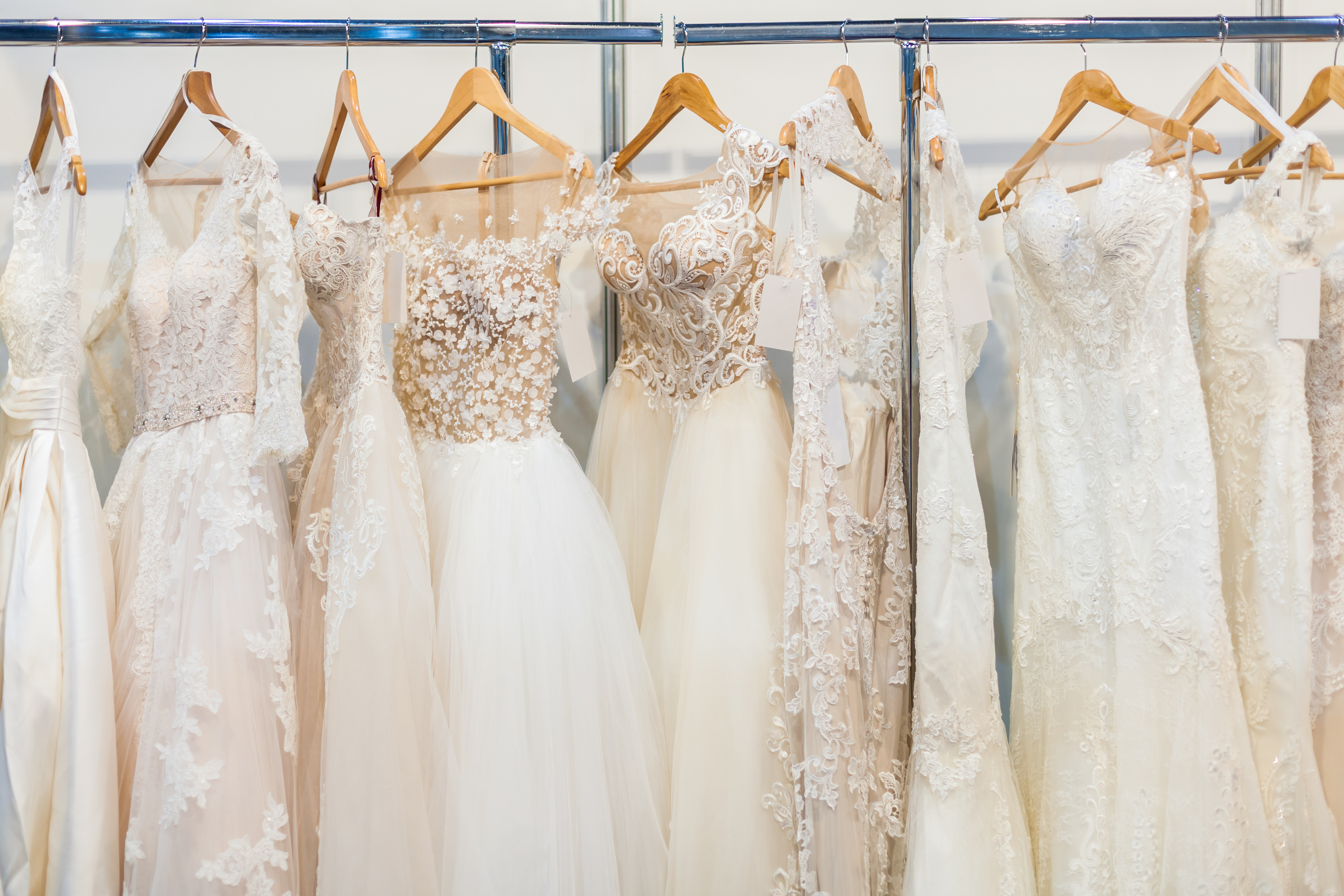 Bridal dresses hanging on a rack
