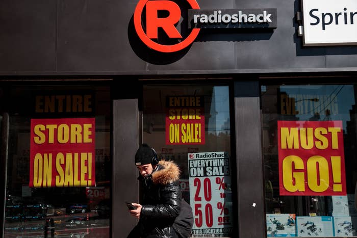 A person in front of RadioShack