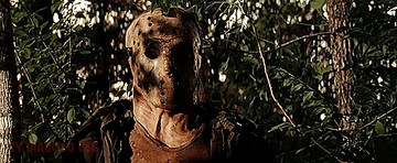 A camera zooms in on the wet decrepit mask of Jason Voorhees