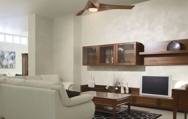 the 3-blade fan with a light hanging in a living room