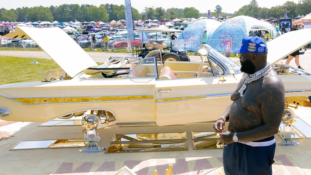 Rick Ross put on his second annual car and bike show this past weekend and hosted a massive crowd at his Atlanta home along with a performance by Gucci Mane. Here's our interview with the rapper.