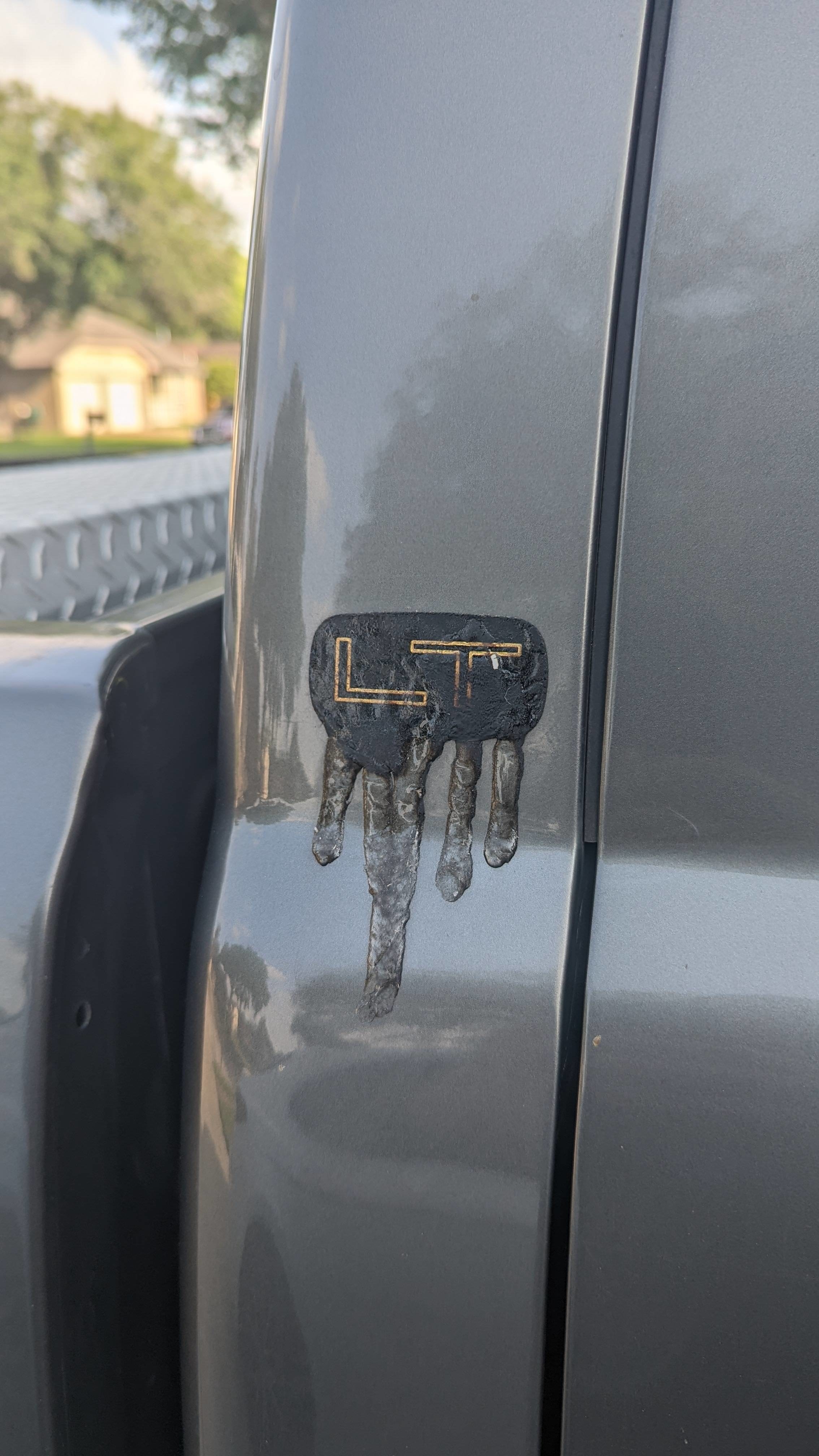 A melted logo on a truck