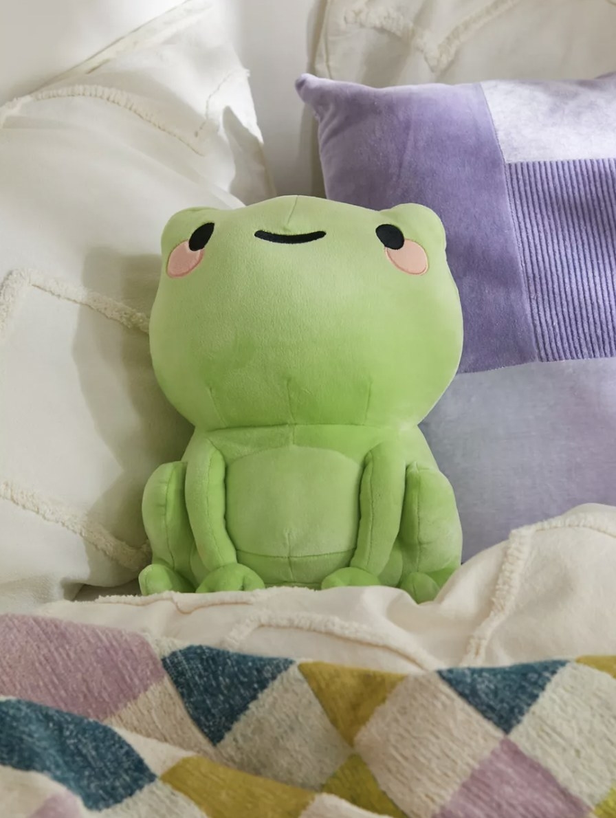 The plushie on a bed