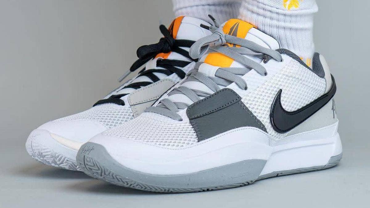 The Nike Ja 1 is set to release in a "Light Smoke Grey" colorway, which features grey and black accents, as well as vibrant color pops, on a white-based shoe.