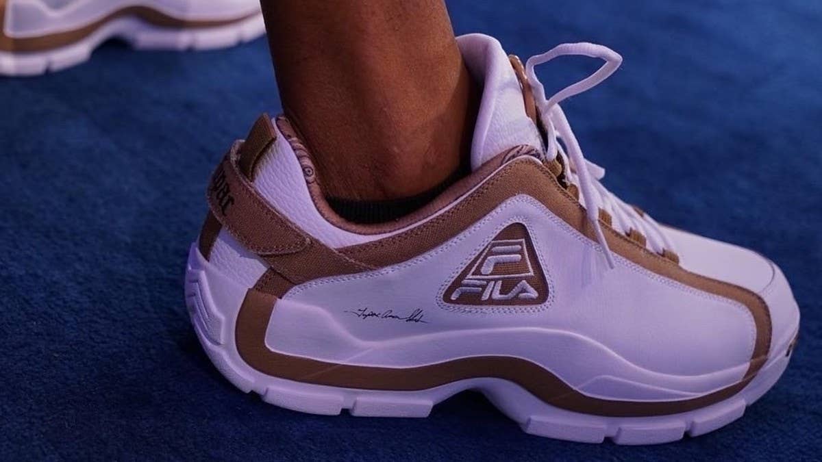 The Tupac x FILA Grant Hill 2 Low celebrates Tupac Shakur wearing the FILA Grant Hill 2 in his 'All Eyez On Me' photo shoot in 1996. Releasing Fall 2022.