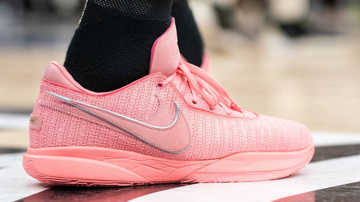 LeBron James wore the Nike LeBron 20 in pink for his first Drew League Game since 2011 on Saturday. The new signature shoe is a low-top with displaced Swooshes.