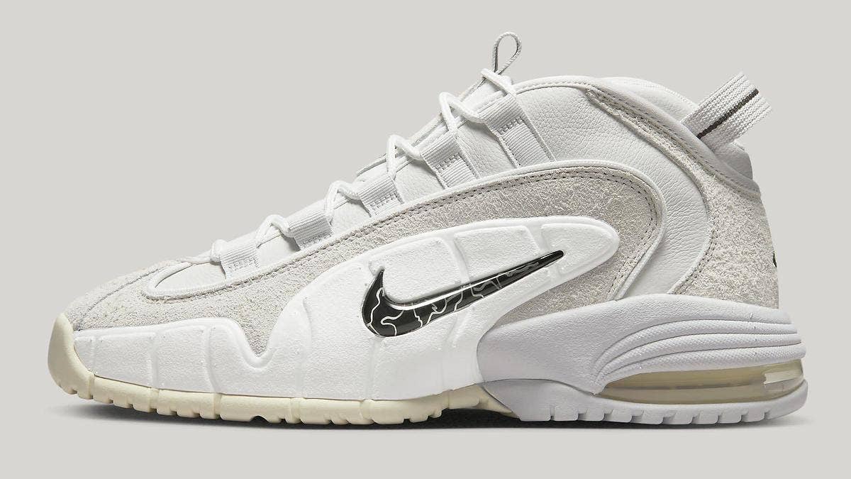 The 'Photon Dust' Nike Air Max Penny 1, a new addition to the model's lineup, blends a tasteful array of white and creams on the classic hoop shoe.