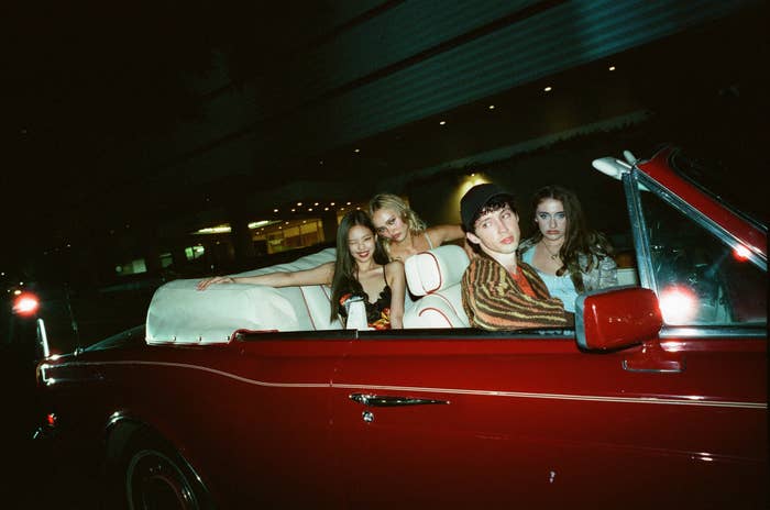 The cast of &quot;The Idol&quot; sitting in a convertible