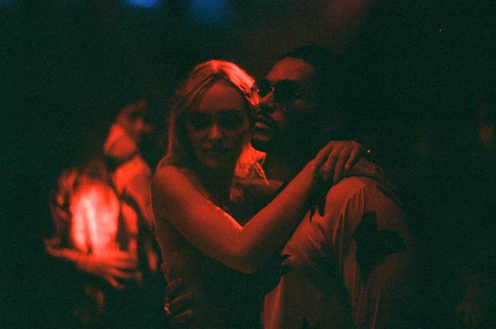 Jocelyn with her arms around Tedros in a dark room in a scene from &quot;The Idol&quot;