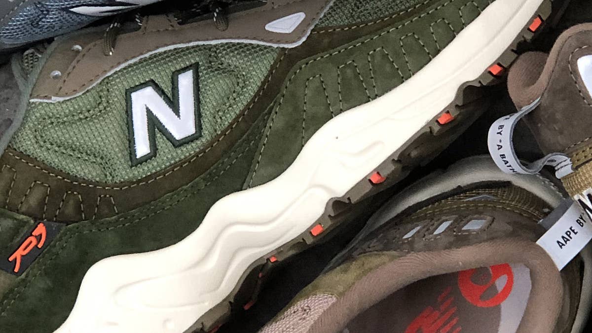 AAPE by A Bathing Ape and New Balance have a new 703 collab dropping in Fall 2021, which will be available in beige, army green, and black colorways.