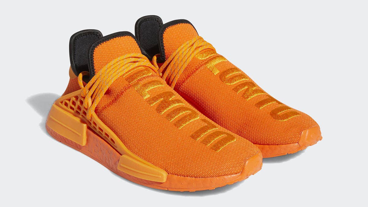 Pharrell's popular Adidas NMD Hu sneaker is dropping in a new orange colorway in June 2021. Here are the official release details and a closer look at the shoe.