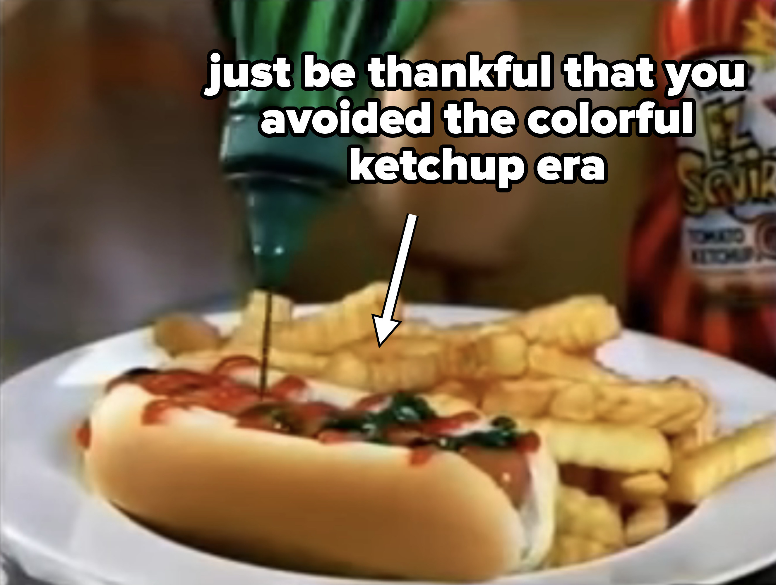 A bottle of green Heinz EZ Squirt ketchup being squirted on a hot dog