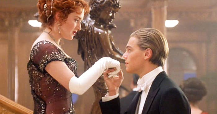 Leonardo DiCaprio as Jack kisses Rose&#x27;s (Kate Winslet) hand in &quot;Titanic&quot;