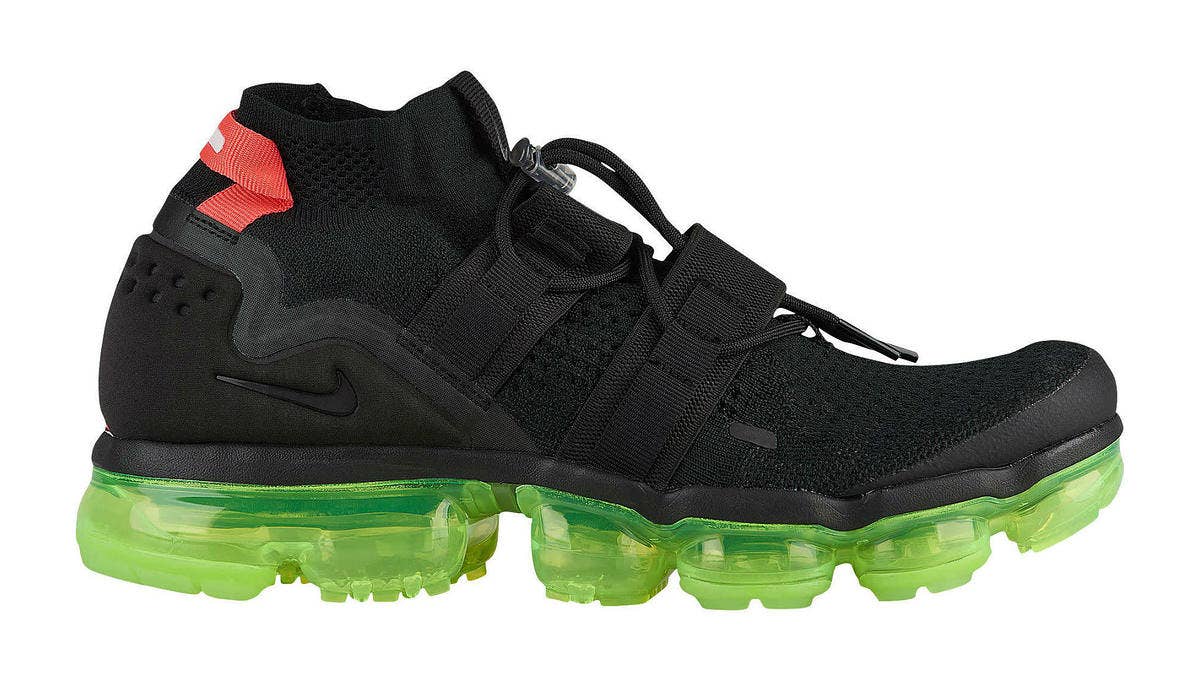 The 'Yeezy' Nike Air VaporMax Flyknit Utility surfaces in a black-based colorway with bright red and green accents that is drawing comparisons to Kanye West's Nikes.