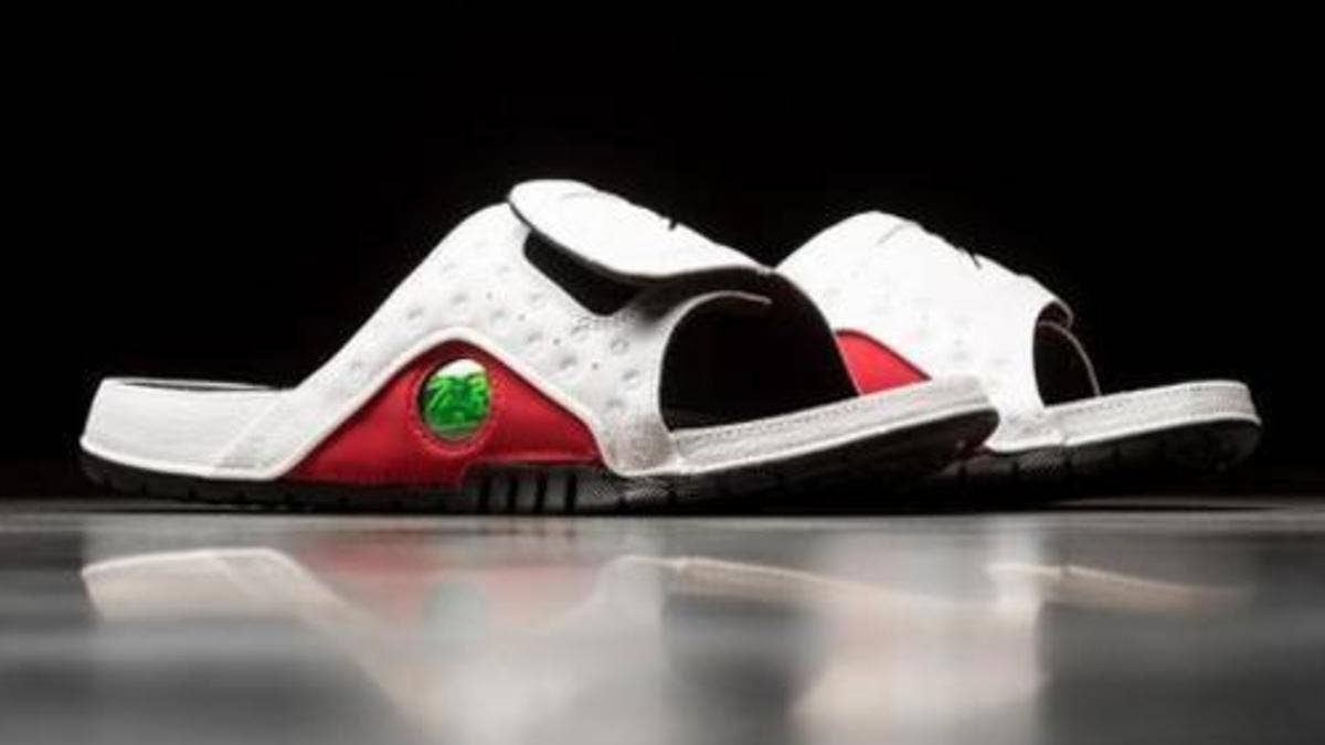 The Jordan Hydro 13 Slides in "White/Red" and "Black Cat" colorways are available now.