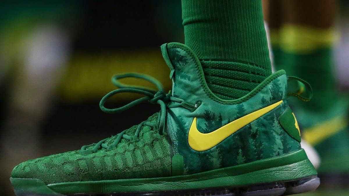 The Nike KD 9 in an Oregon Ducks colorway with tree graphics on the upper.