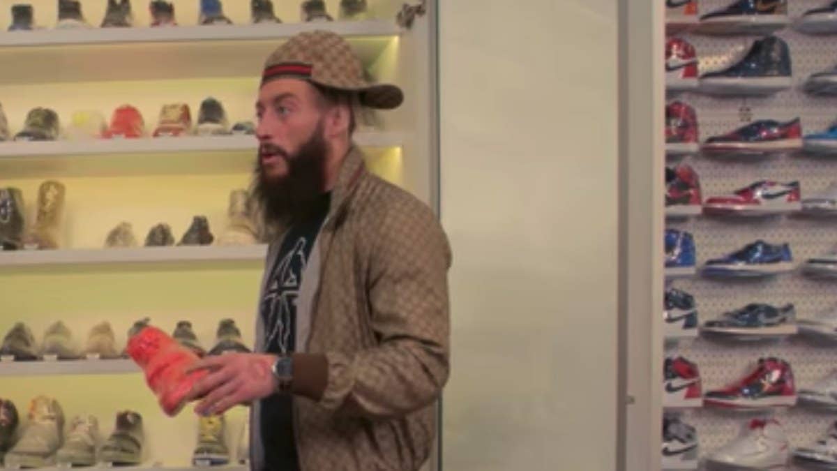 The WWE's Enzo Amore tries to pick out his Wrestlemania sneakers.