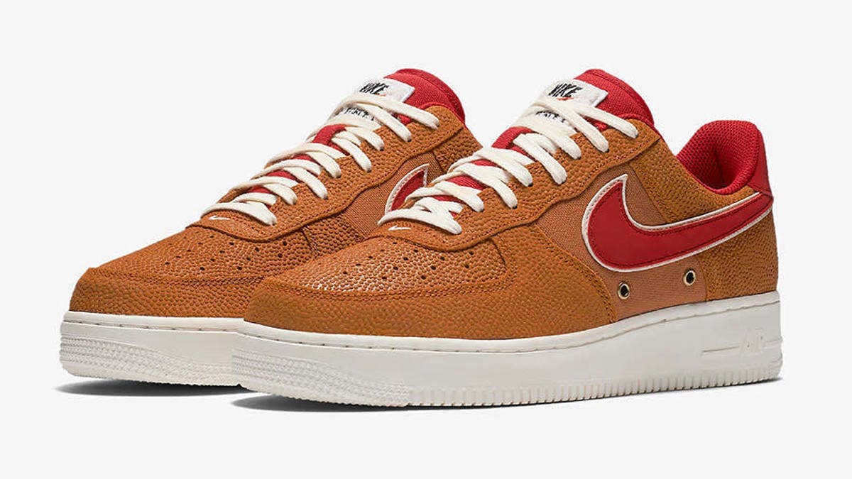 The Nike Air Force 1 celebrates its rich basketball heritage with orange textured leather.