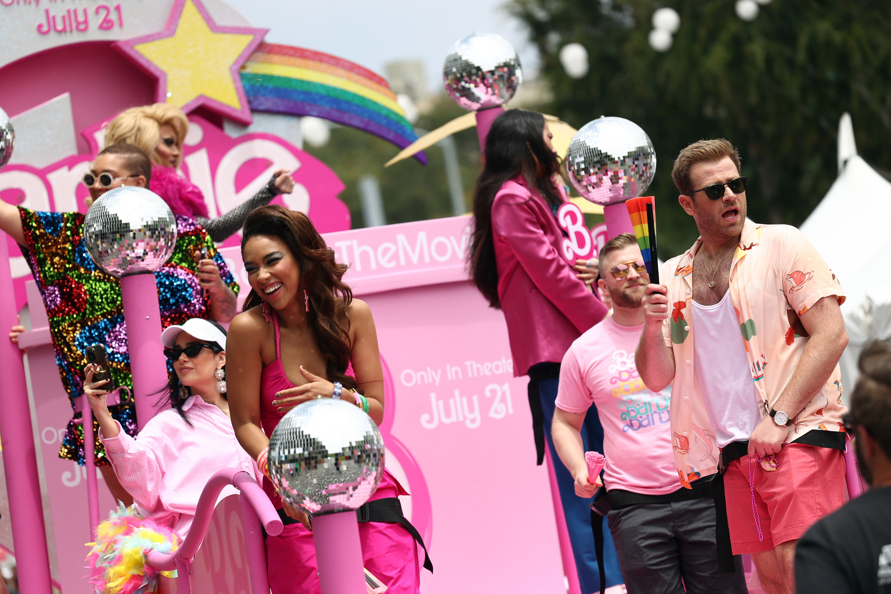 Alexandra Shipp and Scott Evans on the &quot;Barbie&quot; float at the Pride parade