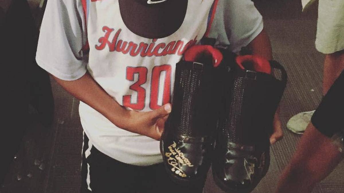 This kid came up on a free pair of autographed Jordans from Drake.