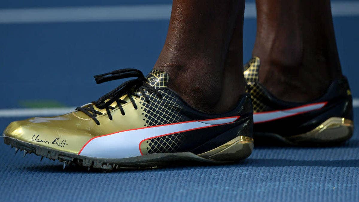 Bolt's golden spikes hard to miss despite blazing speed.