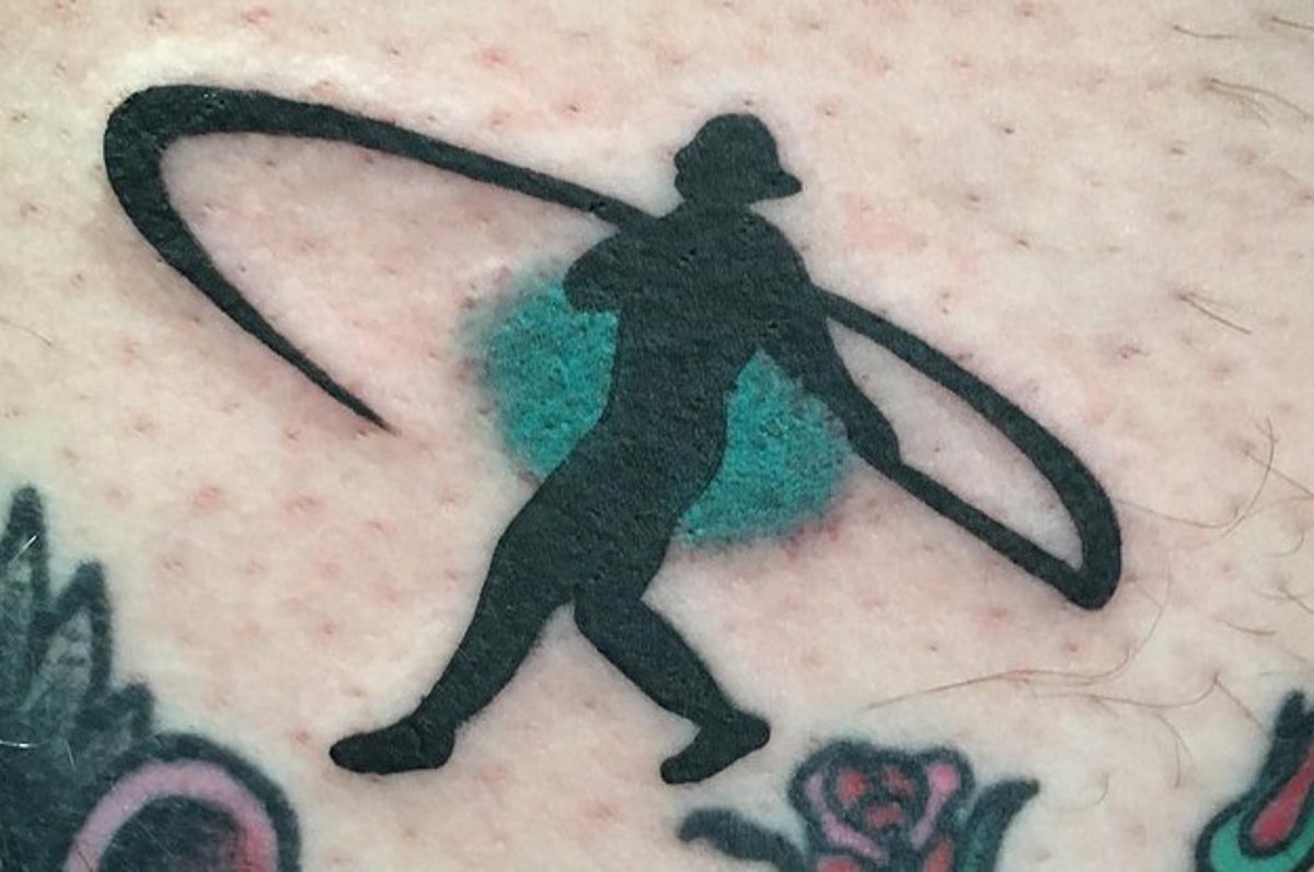 Man Gets Ken Griffey Jr. Swingman Logo Tattoo