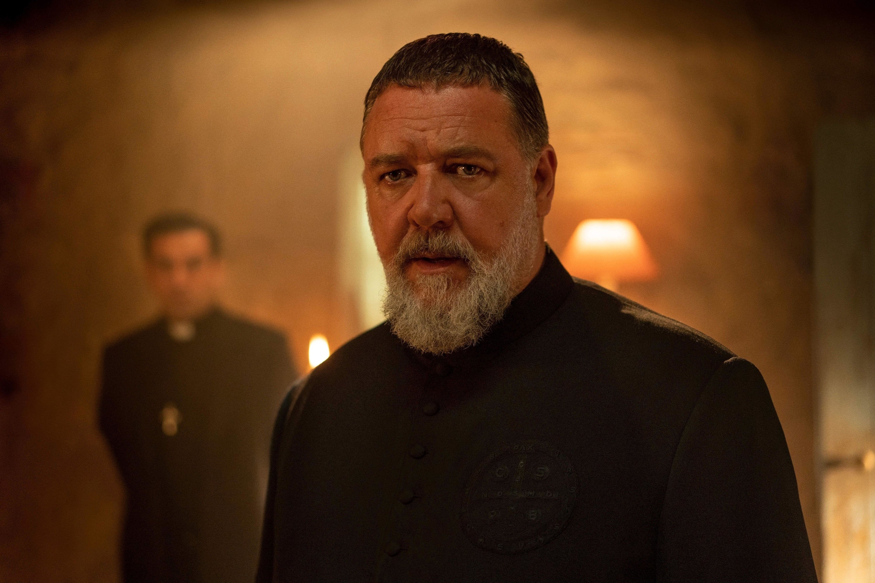 Russell Crowe stares intensely as a demon-battling priest
