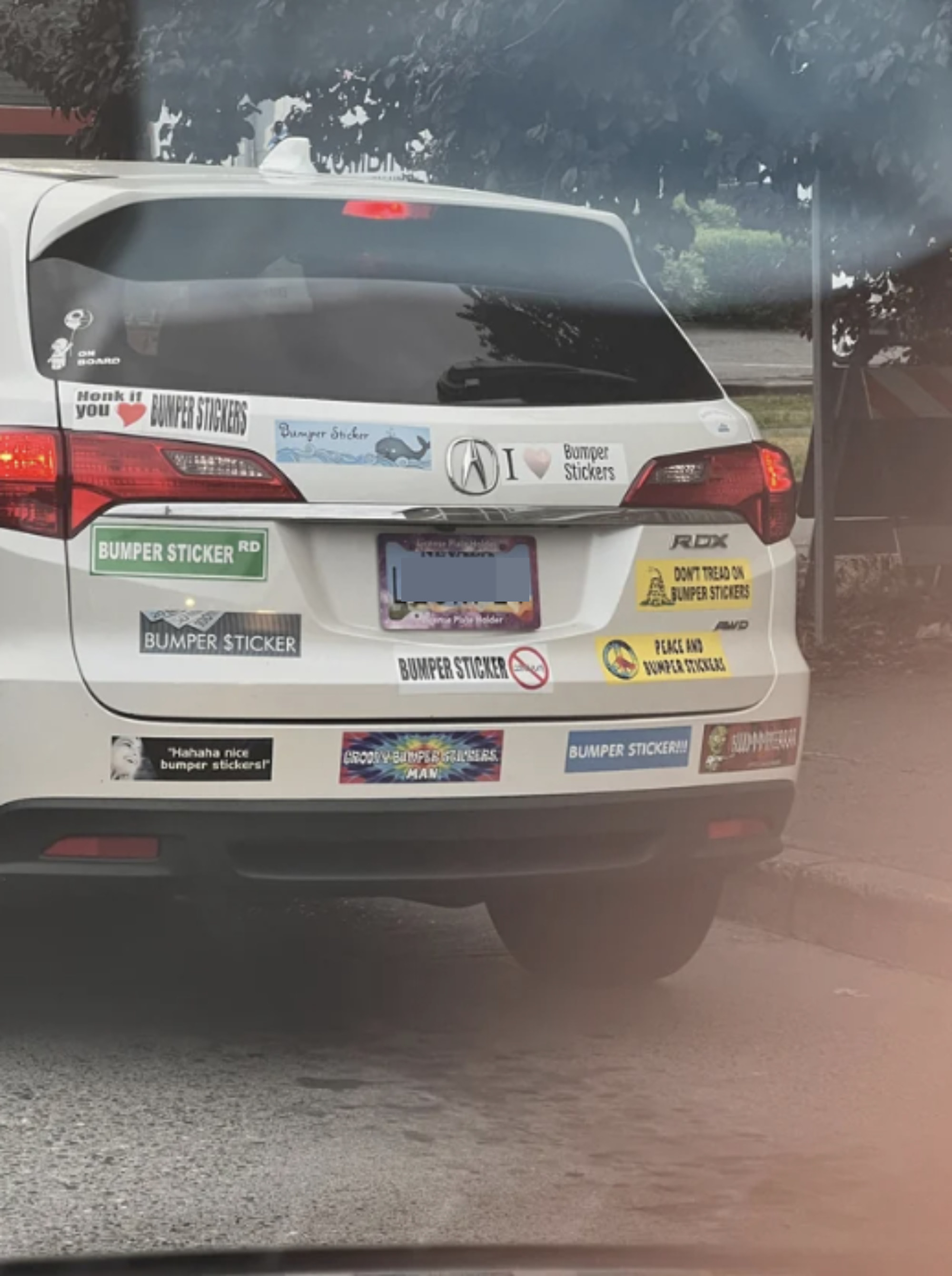 a car that has only bumper sticker themed bumper stickers