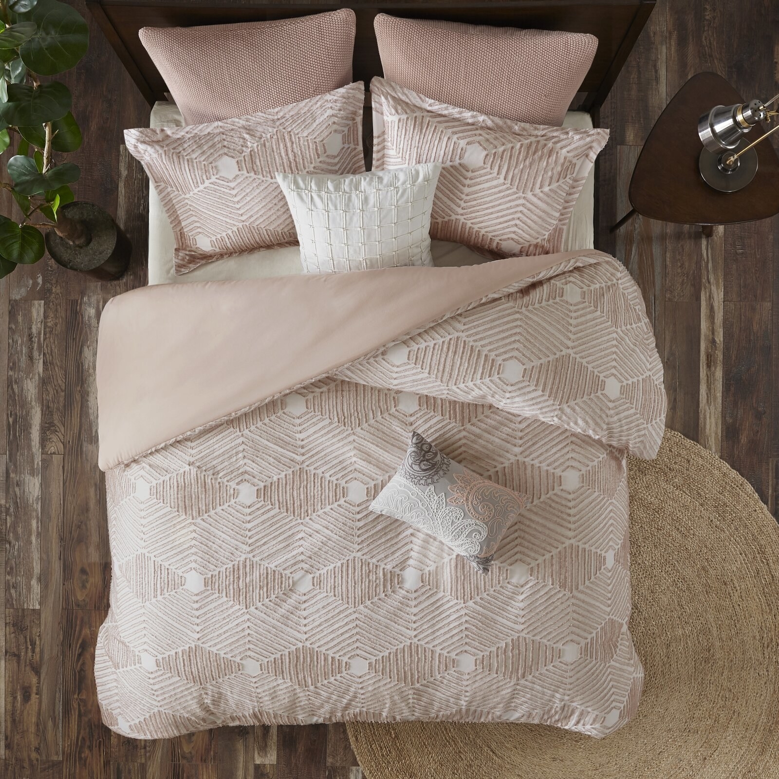 The set in blush on a bed