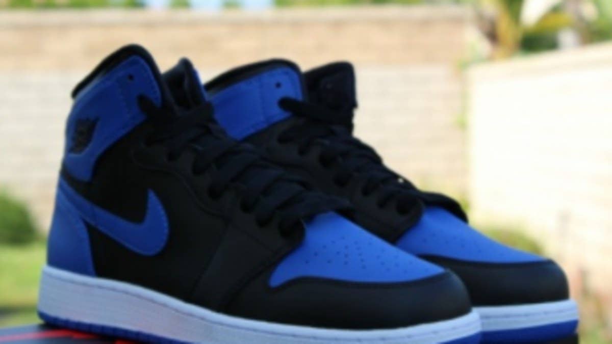 The young ones will relive history as well with the upcoming Black/Royal Blue Air Jordan 1 Retro also on its way in grade school sizes.