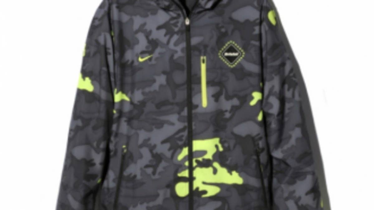 F.C.R.B. debuts a new camouflage rain jacket as part of its A/W 2011 line.  