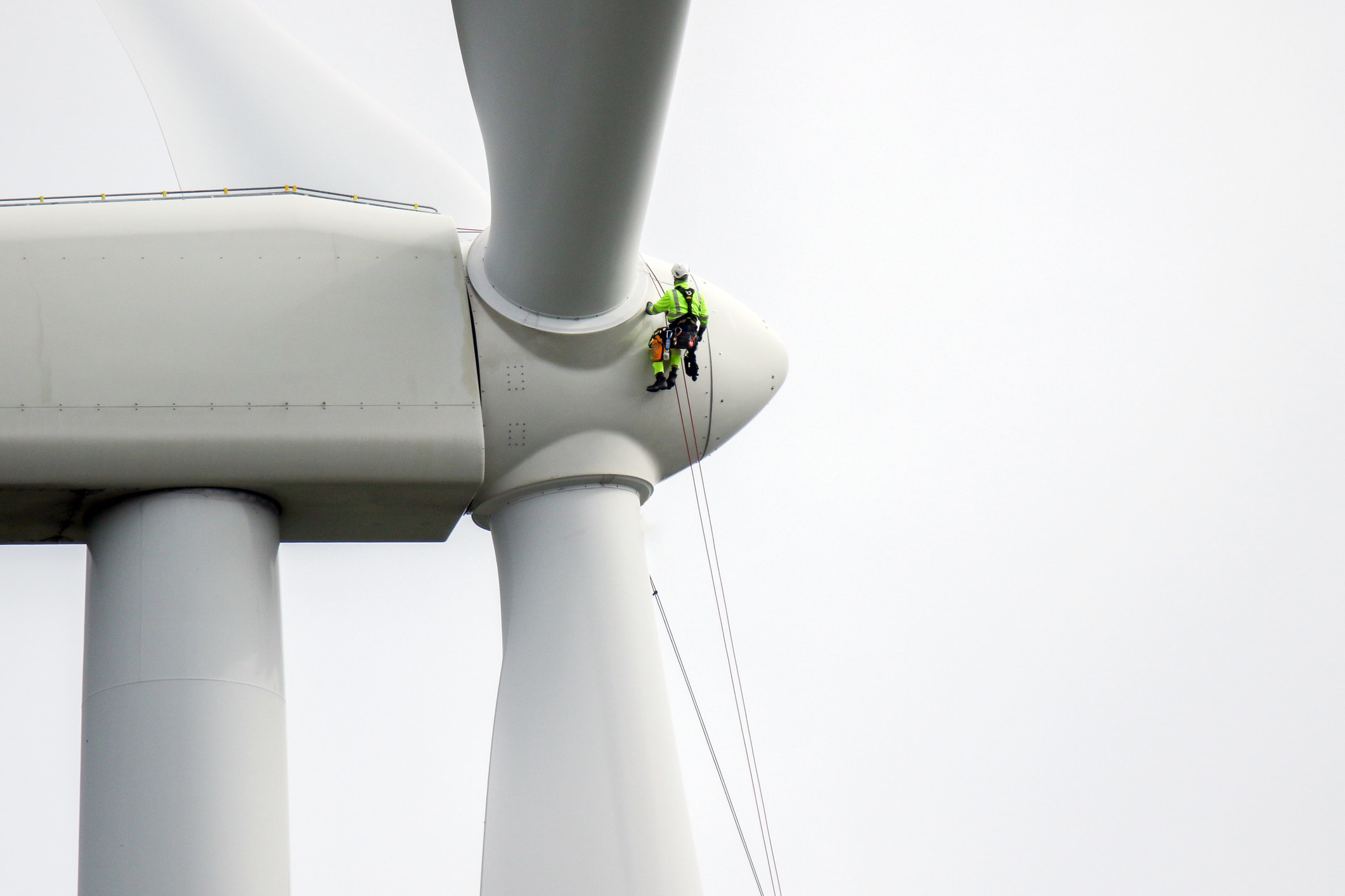 A man on a wind turbine