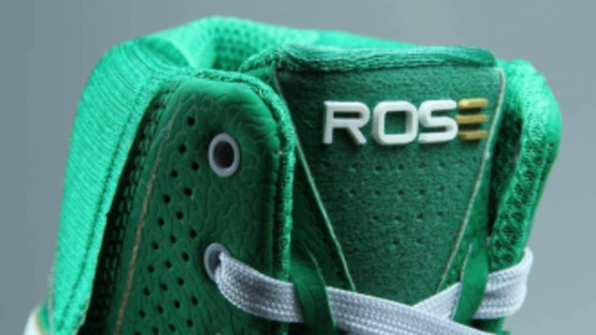 Derrick Rose looks to get lucky in green adidas shoes.