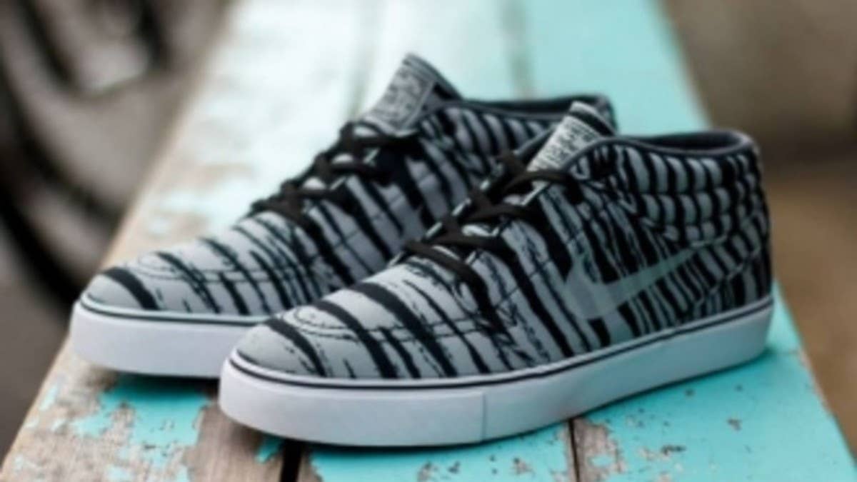 Nike Skateboarding introduces yet another tiger stripe covered Stefan Janoski Mid for the summer.