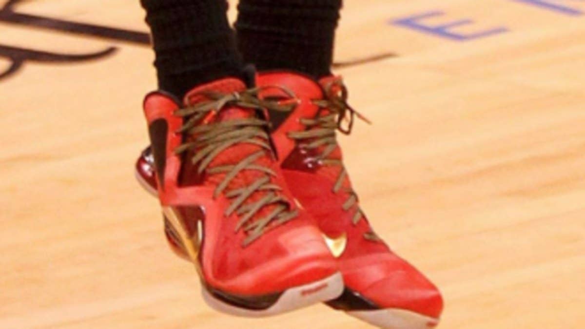 LeBron opens eyes with a red-based Elite 9 PE in Game 1.