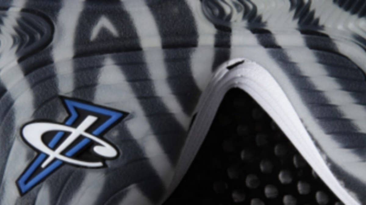 Tiger stripes highlight this special make-up of the Air Penny V inspired by his college career.