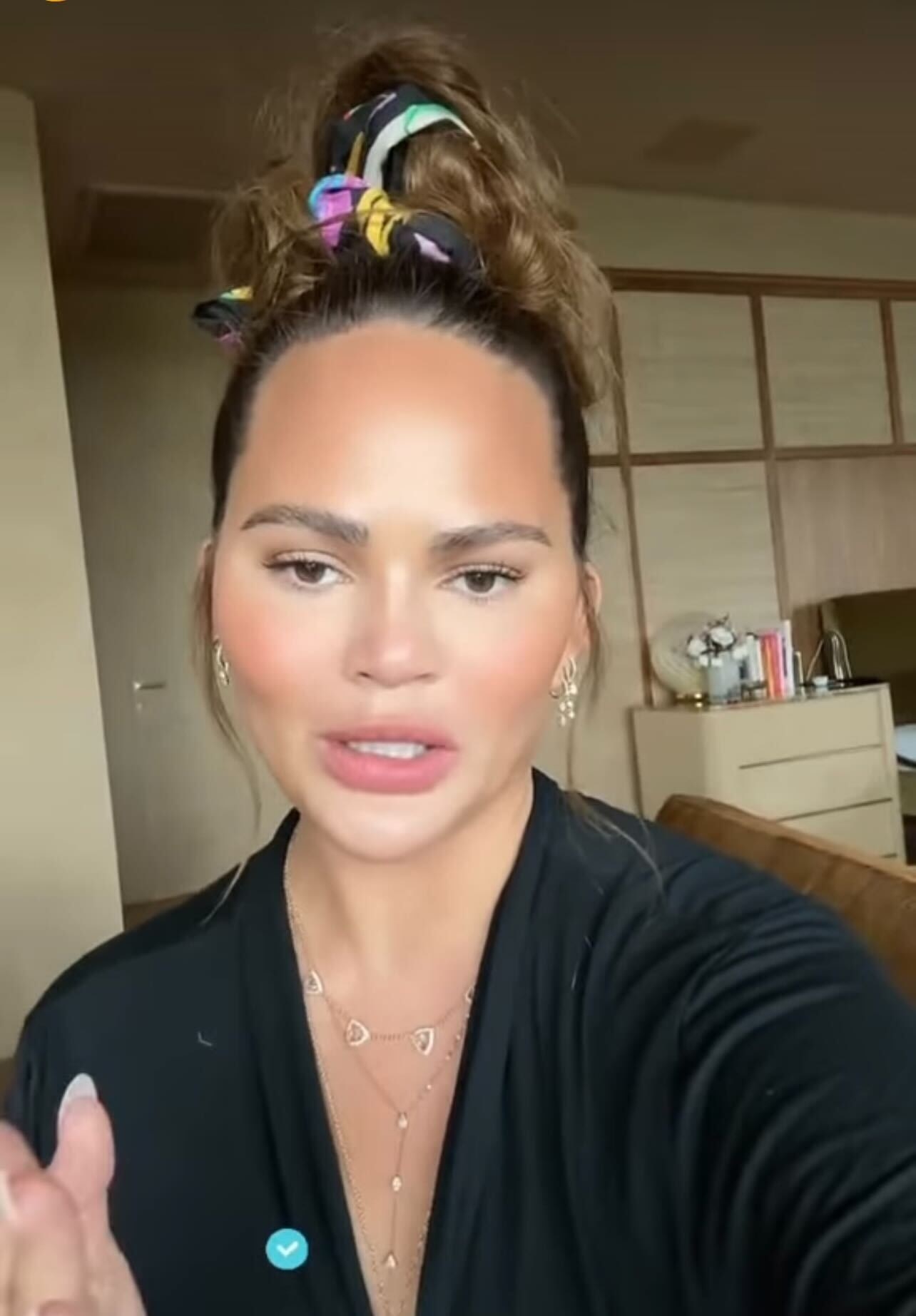 Chrissy Teigen Spirals After DNA Test Reveals Lost Twin