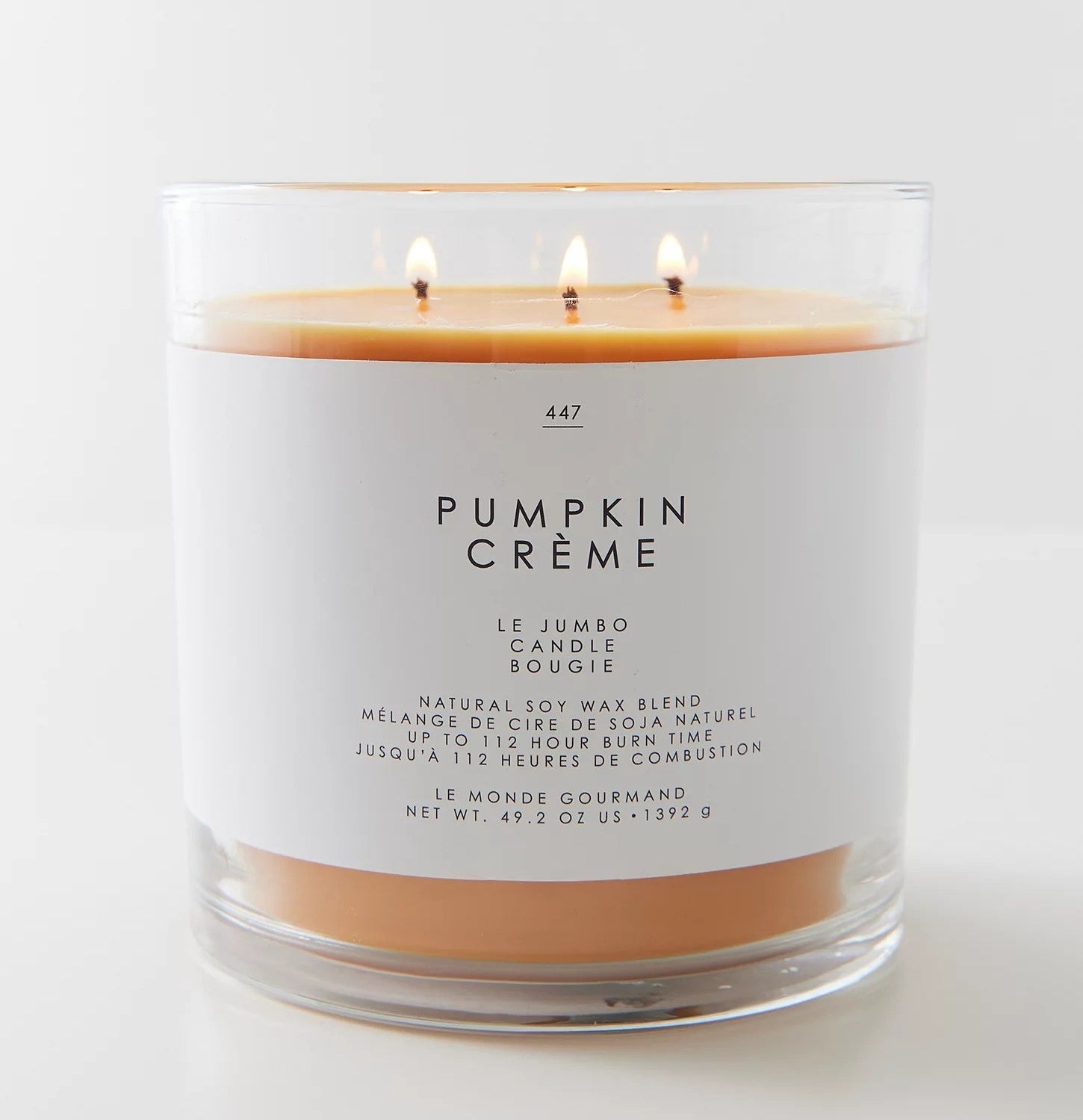 lit pumpkin creme-scented candle